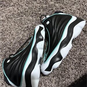 Jordan Black and White Sneakers with Teal Highlights